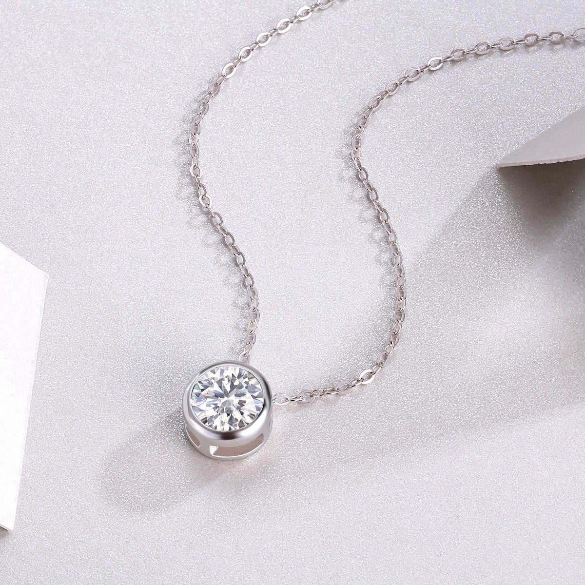 1-carat round moissanite bezel pendant close-up