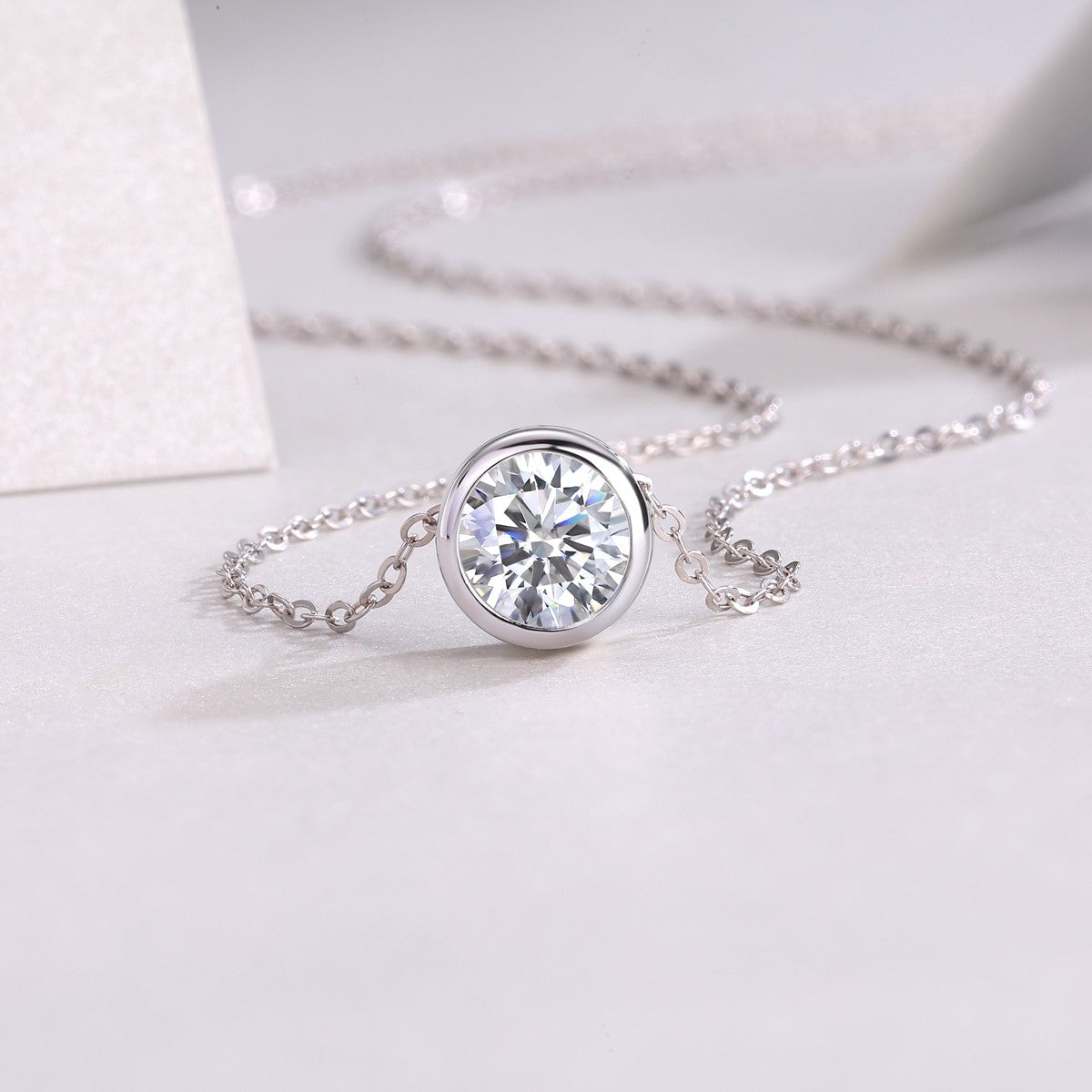 Platinum-plated sterling silver necklace with moissanite stone