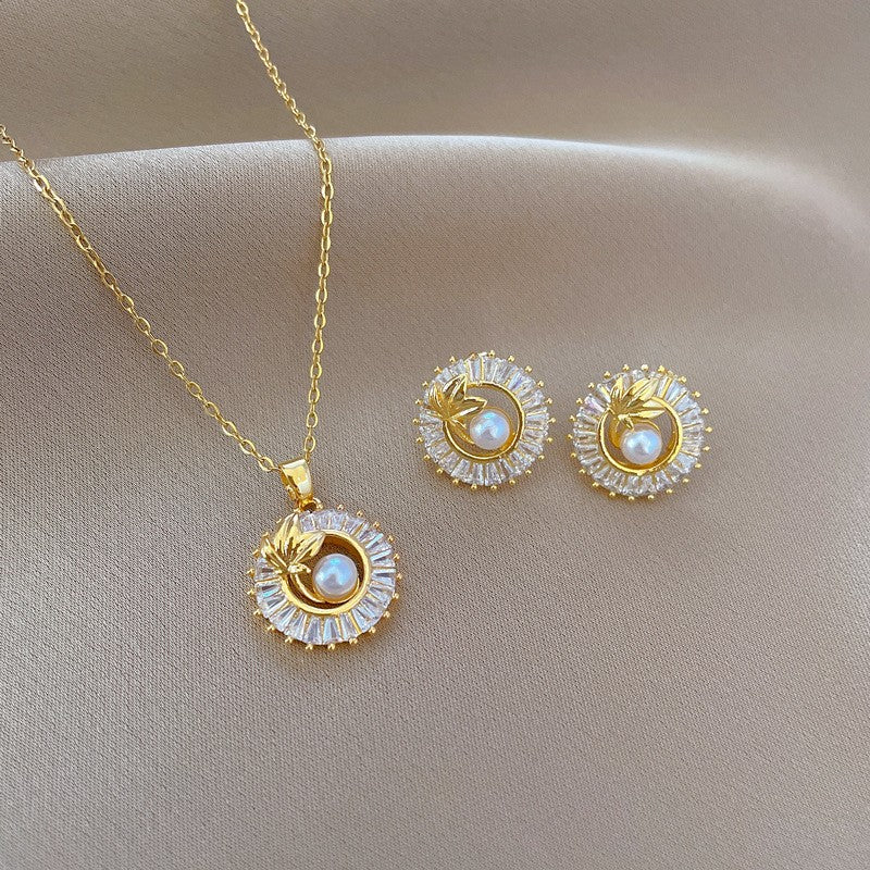 Elegant Pearl & Crystal Leaf Necklace and Earrings Set
