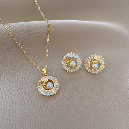 Elegant Pearl & Crystal Leaf Necklace and Earrings Set
