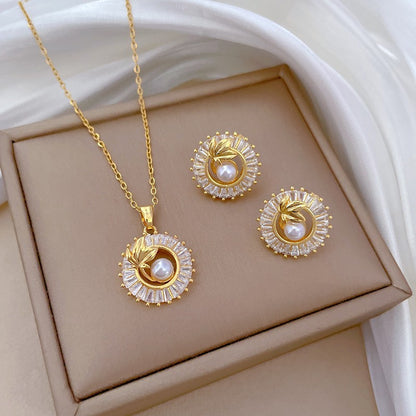Elegant Pearl & Crystal Leaf Necklace and Earrings Set
